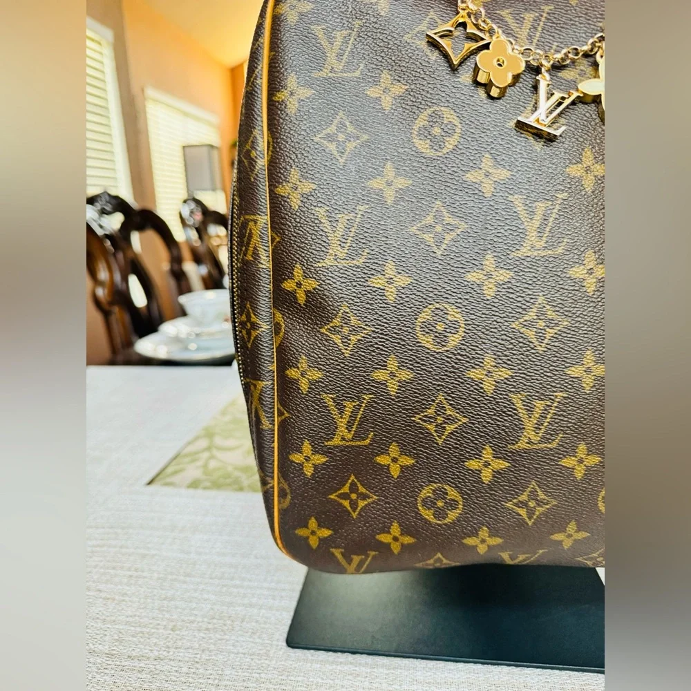 Authentic Louis Vuitton Monogram Excursion - Picture 2 of 13